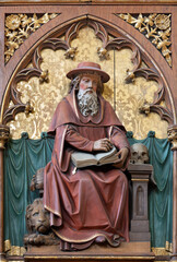 Fototapeta na wymiar VIENNA, AUSTIRA - JUNI 24, 2021: The relief of St. Jerome the doctor of west church in the church Marienkirche by unknown artist from end of 19. cent.