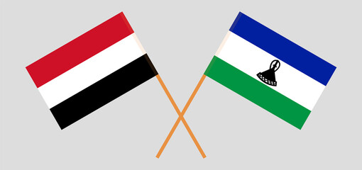 Crossed flags of Yemen and the Kingdom of Lesotho. Official colors. Correct proportion