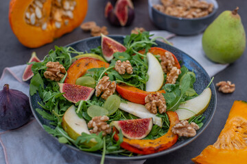 Autumn pumpkin salad and figs, pears and walnuts