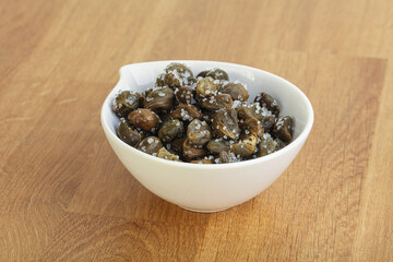 Salted marinated capers snack appetiser