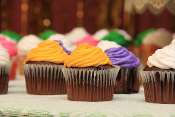 Birthday desserts on a party table. Colorful cake