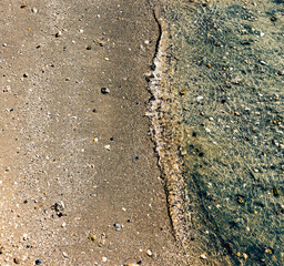 waves coming ashore on the beach