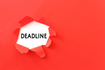 Red background with hole and the word deadline