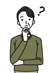 考えるシニア女性