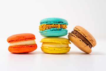 Macaroons on a white background, colorful macaroons french cookies. Macaroons.
