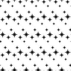 Seamless ornament with black shining stars and sparkles on white background.