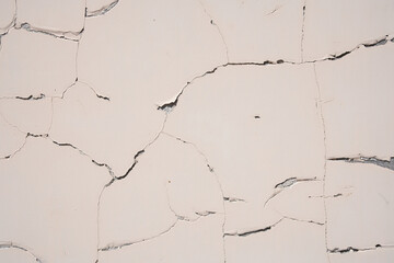 Overlay for your design. Background texture of a white cement wall with a crack. A crack in the old wall. High quality photo
