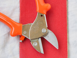 powerful metal garden shears with red handle