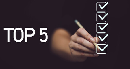 
Hand writing Top 5. 5 checkmarks on black background