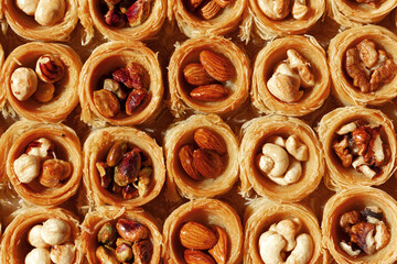 Background of traditional arabic dessert Baklava with honey and nuts