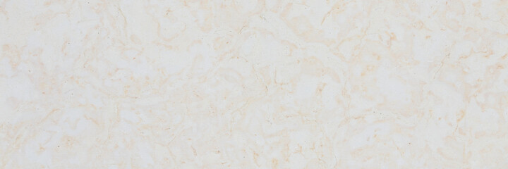 Dolomite texture. Natural rock with beautiful beige patterns on the surface. Polished flat stone. Classic luxury decoration building material. Wide panoramic texture for background and design.