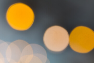bokeh of light on out of focus picture in dark background.
