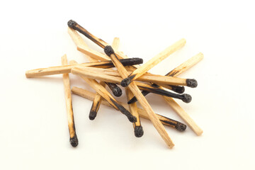 handful of charred matches close-up