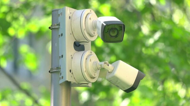 Security cameras on the pole in 4k slow motion 60fps
