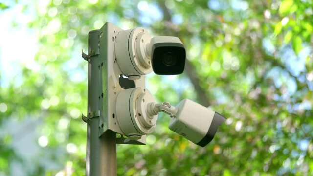 Security cameras on the pole in 4k slow motion 60fps
