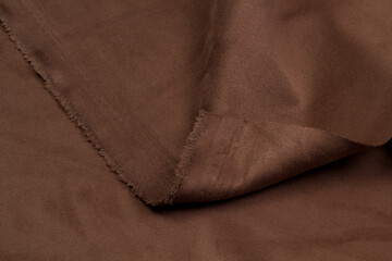 Leather colored top view, folds. Brown suede.	
