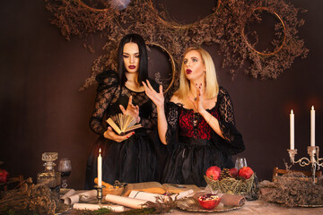 Incredible, amazing, seductive girls in a dress. Magic. Spell. Mythology. The background is fantastic. Art photography. Halloween.