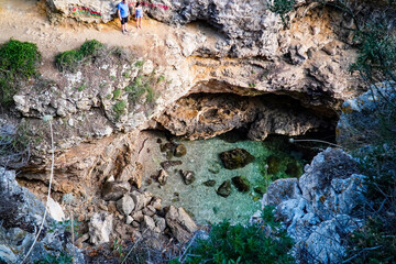 cliffs over the sea , rocky landscape , sea lagoon , sea grotto in the rock 