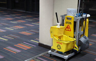 Closeup of janitorial, cleaning equipment and tools for floor cleaning. 