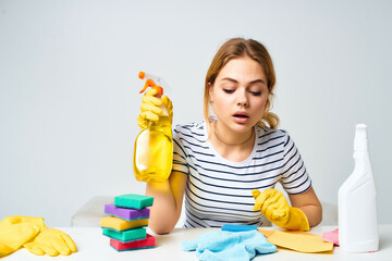 housewife detergent rags sponges light background