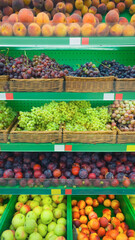 Fruits assortment on supermarket showcase with empty price tags