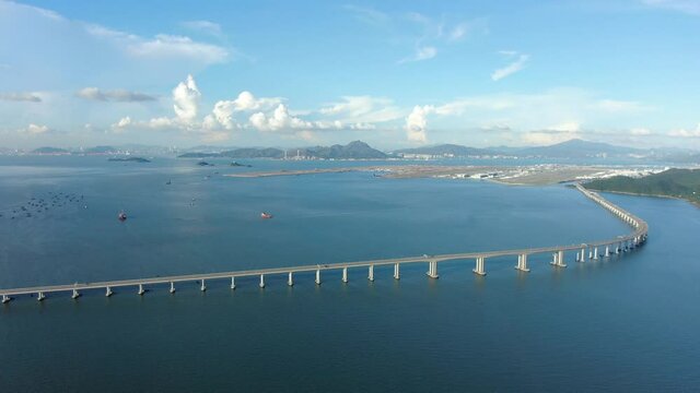 Hong Kong Zhuhai Macau Bridge on a beautiful day, wide angle aerial view.