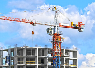 Crane and highrise construction site