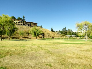 Grass lawn at Peach orchard beach park. Okanagan Lake, Summerland, BC, Canada