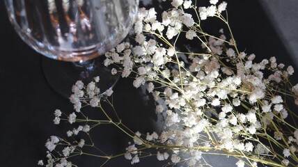 glass of water with flowers