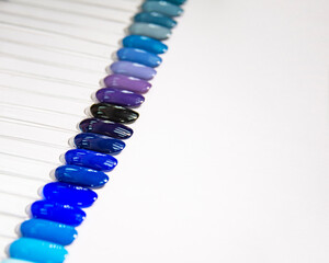 Obraz premium Multicolor different palette gel varnishes examples for manicure on the white background
