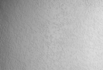 Blurred image of white cement wall for background, The softness of the white background is like a fluffy cloud. The surface of the surface of the white background.