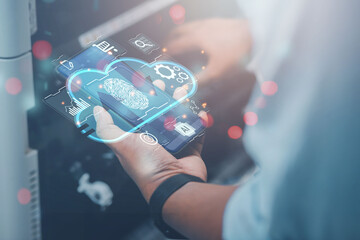 Business man builds a virtual interface using smartphones to exchange data storage for industrial networking, cloud technology concept.
