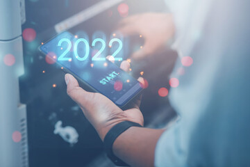 Smartphone business trends in 2022. Businessmen or manufacturers analyze the development of innovative information technology systems to keep up with the world of Internet networking.