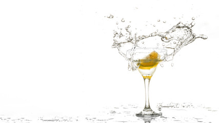 Sparkling water with lemon, in a glass with splashes and drops isolated on white background.Summer drink , front view, copy space