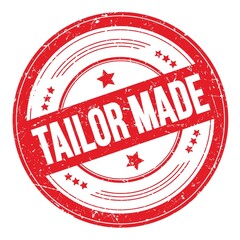 TAILOR MADE text on red round grungy stamp.