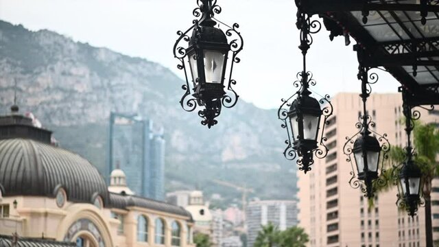 Casino of Monte Carlo building with big metallic lanterns in Monaco, close up view