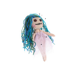 Woman stabbing voodoo doll with pin on white background, closeup. Curse ceremony