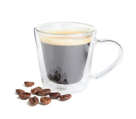 Cup of tasty espresso and scattered coffee beans on white background
