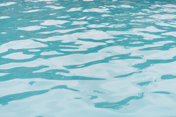 Fototapeta na wymiar blue water in the pool close-up