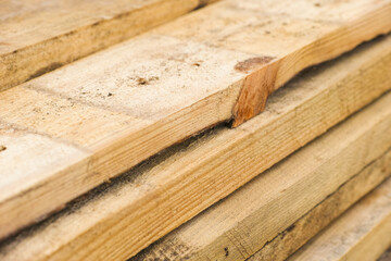 Stack of wooden planks. Close-up