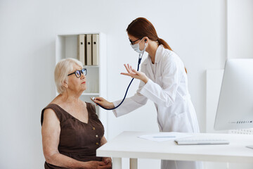 doctor and patient stethoscope examination professional advice