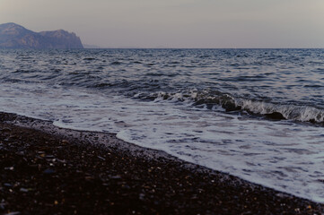 Sea beach in the evening in cloudy weather