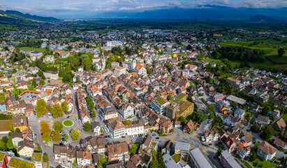 Aerial view around the city altstätten in Switzerland on a cloudy day in summer.	