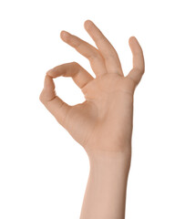 Woman showing okay gesture isolated on white, closeup