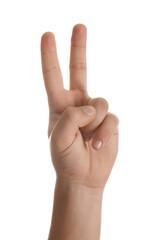 Teenage boy showing two fingers on white background, closeup