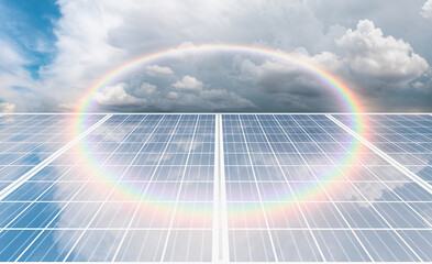 Close-up solar panel solar photovoltaic on stormy cloudy sky background with amazing round shaped rainbow - clean alternative electric energy concept.