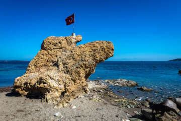 ISKELE, URLA, IZMIR, TURKEY. View on the ''Bride Rock or/Sail Rock'' Gelinkaya or Yelkenkaya