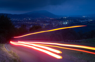 Car lights in motion approaching the city of Donostia-San Sebastian, Euskadi