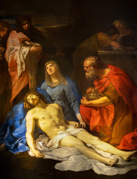 ROME, ITALY - AUGUST 31, 2021: The painting of Pieta in the church Santa Maria della Concezione dei Cappuccini by Andrea Camassei (1602 - 1649).
