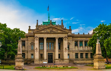 Great panoramic view of the Palais de Justice of Strasbourg before renovation. It is a large 19th-century neo-Greek building in the Tribunal quarter of the Neustadt district of Strasbourg, France. - obrazy, fototapety, plakaty